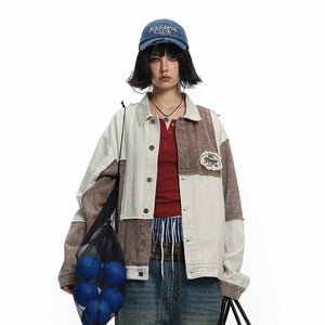 Color Patchwork Denim Jacket – Irregular Design - MRC STORETopMRC STOREA person wearing a beige and brown color patchwork denim jacket with an irregular design, paired with a red top and blue jeans. Accessories include a cap, necklaces, and carrying a net bagMRC STORECJXZ209216902BYBrownL
