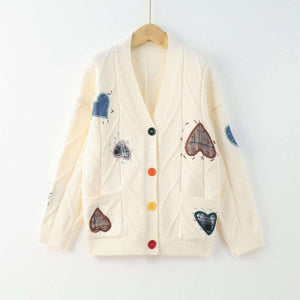 Loose Love Embroidery Knit Cardigan - MRC STORETopMRC STOREA beige long - sleeve knit cardigan with heart embroidery and colorful buttons, displayed on a hanger against a white background.MRC STORECJMY210833003CXPicture ColorL