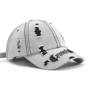 Black adjustable cotton dome hat with ripped letter print embroidery, matching accessories cap for casual style.