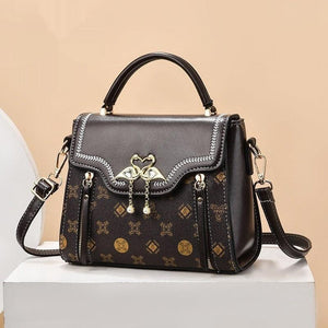 Retro Women’s Shoulder Bag – Printed PVC - MRC STOREAccessoriesMy StoreElegant European Retro Shoulder Bag with Gold Flamingo Detail and Printed Design - MRC STOREMRC STORECJNS216525005EVBrown