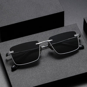 Polarized Sunglasses - UV - Proof Titanium - MRC STOREAccessoriesMy StoreA pair of women's polarized sunglasses with a black frame and grey lenses, displayed on a dark platform with a reflective surface.MRC STORECJCF201152103CXBlack Frame Black Gray