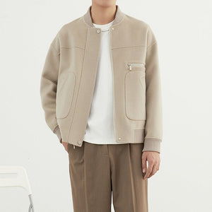 Woolen Coat - Short Baseball Style - MRC STOREJacketsMy StoreA male model wearing a beige woolen coat with long sleeves and a straight hem, paired with a white t-shirt and brown trousers.MRC STORECJXZ232889502BYBlackL