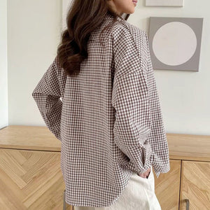 Plaid Shirt - Loose Cotton Fit - MRC STOREshirtMy StorePerson wearing a checkered shirt in a room with wooden furniture and a painting on the wall.MRC STORECJYD210691303CXPlaidL