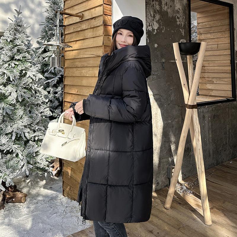 Mid Length Plus Size Hooded Cotton Coat - MRC STORETopMy StoreA woman wearing a mid - length hooded cotton coat in a milky white color, standing near a Christmas tree and wooden structures.MRC STORECJJK211344730DWBeige3XL
