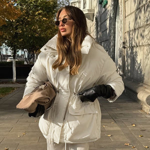 Slim - Fit Cottonpadded Drawstring Waisttight Jacket - MRC STOREJacketsMRC STOREWoman wearing a white puffer jacket on a city street.MRC STORECJJK255501003CXBeigeL