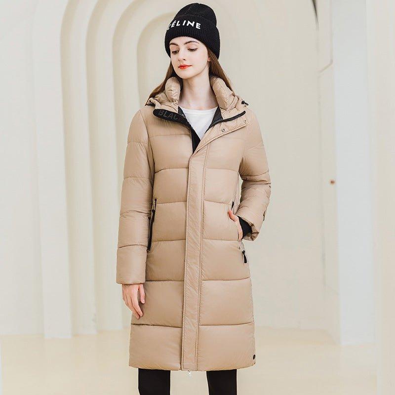 Long Hooded Winter Coat - MRC STOREJacketsMRC STOREA woman wearing a long black hooded winter coat with full - length sleeves and standing in a light - colored space.MRC STORECJWJ217303819SHKhakiL