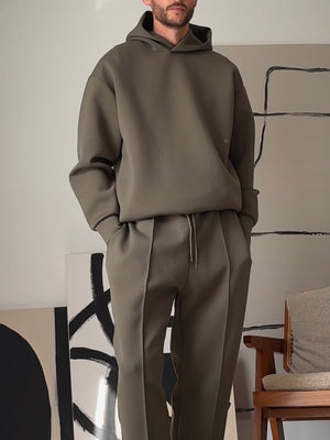 Casual Hooded Sweatshirt Elastic Waist Pants Set - MRC STOREsetMRC STOREPerson wearing a brown tracksuit standing in a room with abstract art on the wall.MRC STORECJMS246379705EVAS Show2XL