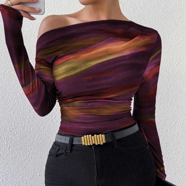 Graphic T-Shirt - Long Sleeve Crop - MRC STORET-ShirtsMRC STOREA woman wearing a long sleeve crop t-shirt with an asymmetrical neckline and a tie - dye print in apricot tones.MRC STORECJWL231025005EVStyle12XL