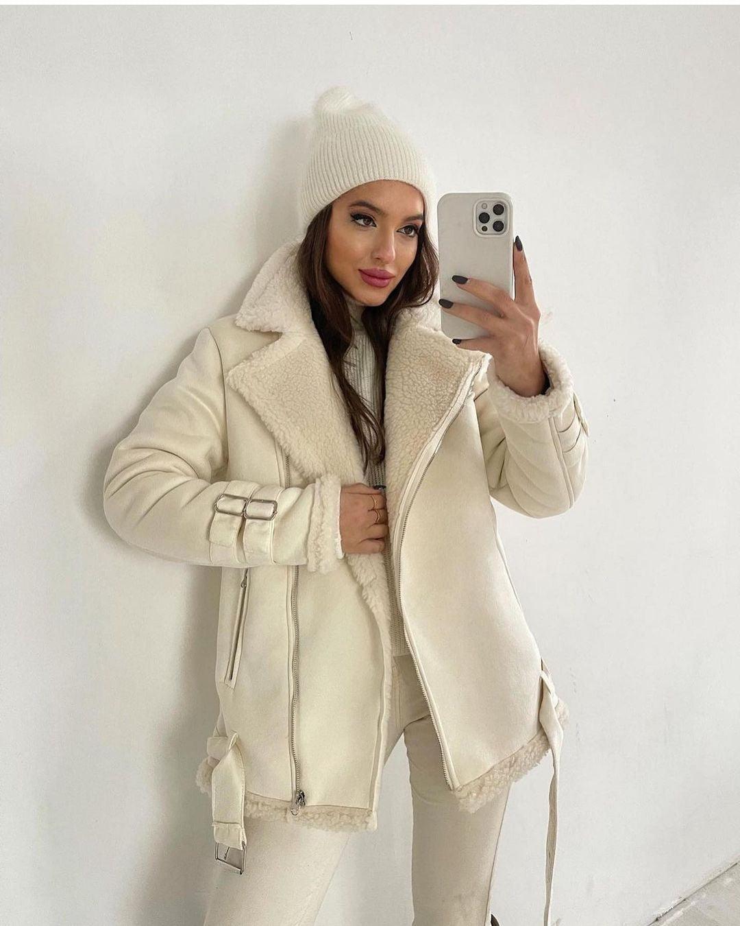 Suede Lapel Zipper Coat - MRC STORETopMRC STOREA woman wearing a black suede lapel zipper coat with a white top and black trousers, posing against a wall.MRC STORECJYD211489911KPBeigeL