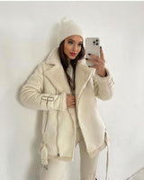 Suede Lapel Zipper Coat - MRC STORETopMRC STOREA woman wearing a black suede lapel zipper coat with a white top and black trousers, posing against a wall.MRC STORECJYD211489911KPBeigeL