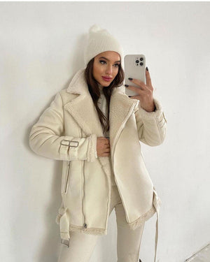 Suede Lapel Zipper Coat - MRC STORETopMRC STOREA woman wearing a black suede lapel zipper coat with a white top and black trousers, posing against a wall.MRC STORECJYD211489911KPBeigeL