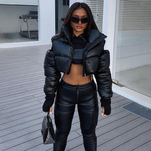 Mechanical Style Off - Shoulder Zipper Cotton Jacket - MRC STOREtopMRC STOREA person wearing a black, off - shoulder, hollow - out cotton jacket with zipper details and a stand - up collar, paired with black leggings. Accessories include sunglasses, a bag, and a chain.MRC STORECJJK212424103CXBlackL
