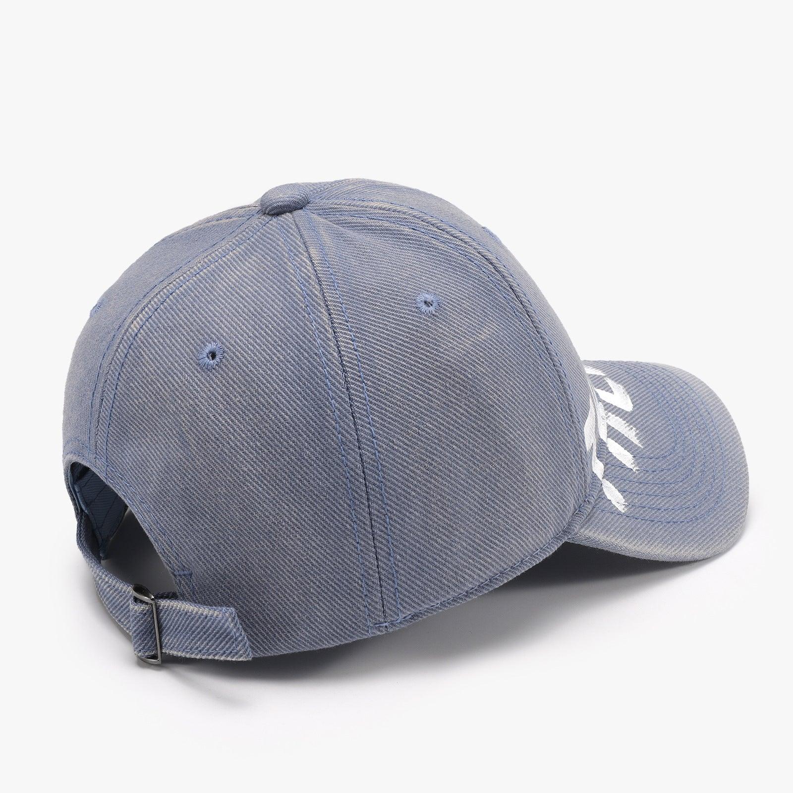 Gray and blue adjustable Letter Graffiti curved brim cap, soft top accessory with bold graffiti-style lettering.