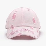 Black adjustable cotton dome hat with ripped letter print embroidery, matching accessories cap for casual style.