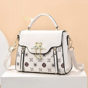 Retro Women’s Shoulder Bag – Printed PVC - MRC STOREAccessoriesMy StoreElegant European Retro Shoulder Bag with Gold Flamingo Detail and Printed Design - MRC STOREMRC STORECJNS216525002BYBeige