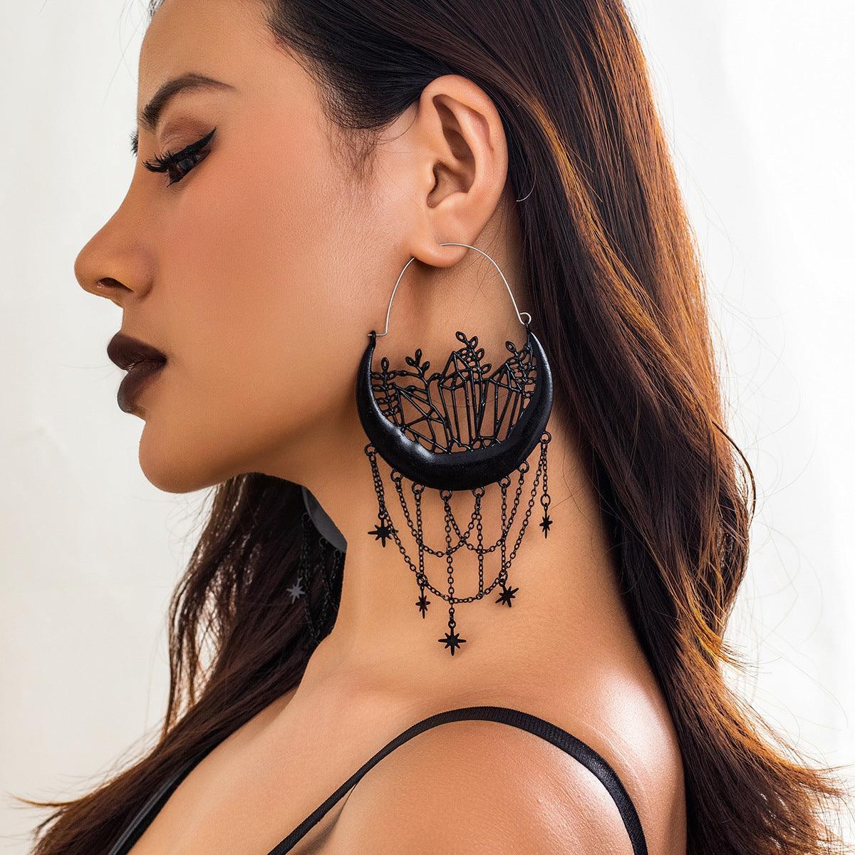 Black Halloween earrings featuring flower and hollow tassel design, stylish stud accessory for festive occasions.