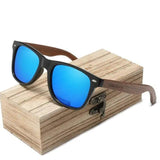 Black sports sunglasses with cool round design, stylish accessory with wooden accents, ideal for active outdoor use.