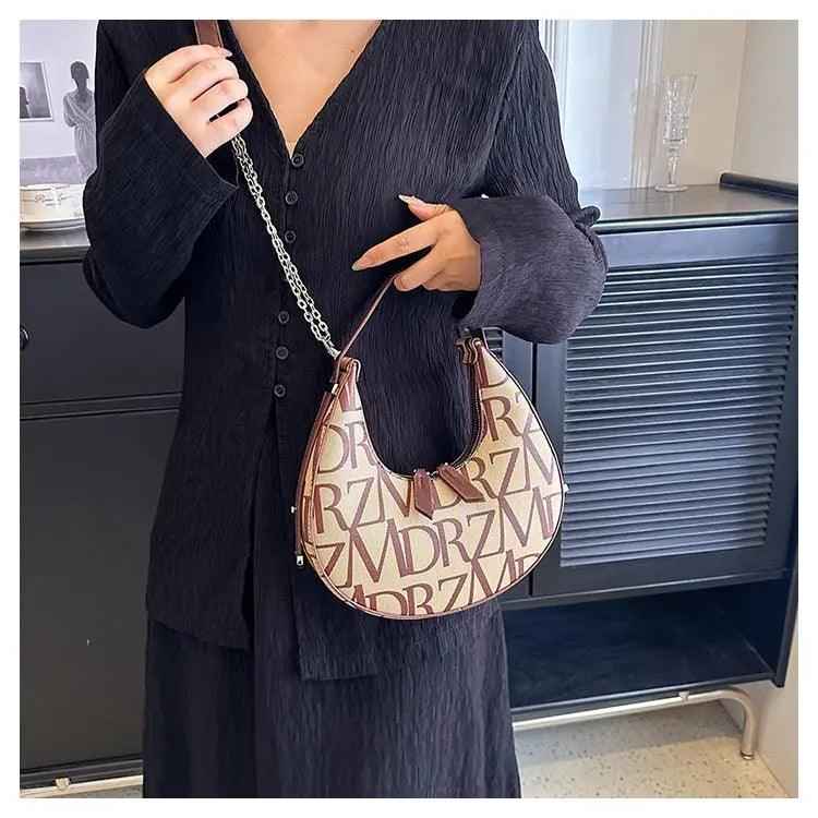 Women’s Crossbody Bag - Dumpling PU Chain - MRC STOREAccessoriesMy StoreWomen’s Crossbody Bag - Dumpling PU ChainMRC STORECJNS198803201AZBrown
