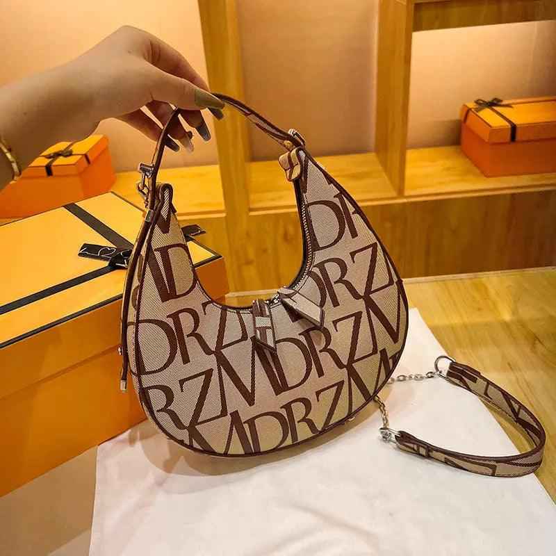 Women’s Crossbody Bag - Dumpling PU Chain - MRC STOREAccessoriesMy StoreWomen’s Crossbody Bag - Dumpling PU ChainMRC STORECJNS198803201AZBrown