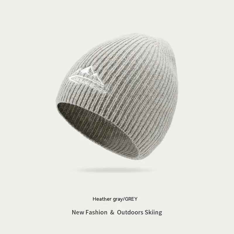 Gray wool beanie from My Store, cozy knit accessory, classic style, lightweight, designed for warmth and comfort.