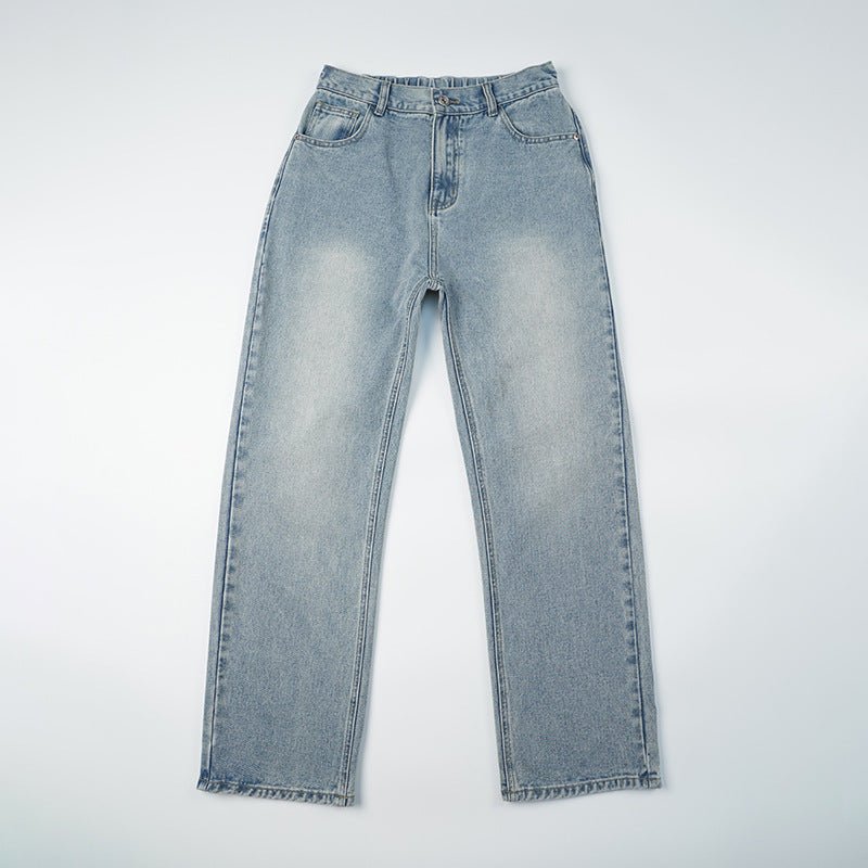 Light blue vintage men's jeans with a loose straight fit, washed wide leg denim trousers, shown in a natural relaxed style.