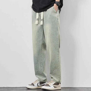 Gray summer wide jeans from My Store featuring a relaxed fit and durable fabric, shown on a model.