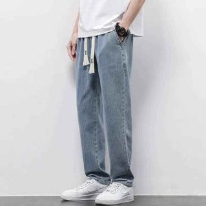 Gray summer wide jeans from My Store featuring a relaxed fit and stylish design, shown on a model.
