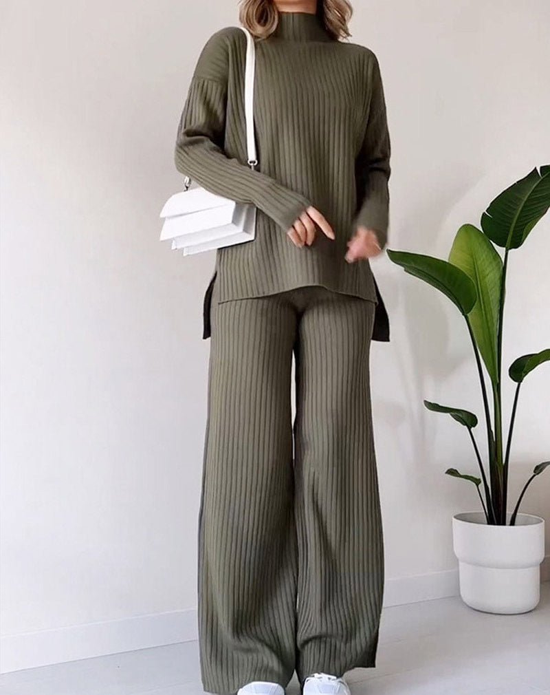 Knitted Suit - Turtleneck Loose Set - MRC STOREsetMy StoreA woman wearing a green knitted turtleneck top and matching straight trousers. Accessories include a white handbag and white shoes.MRC STORECJLS213750611KPBlackL