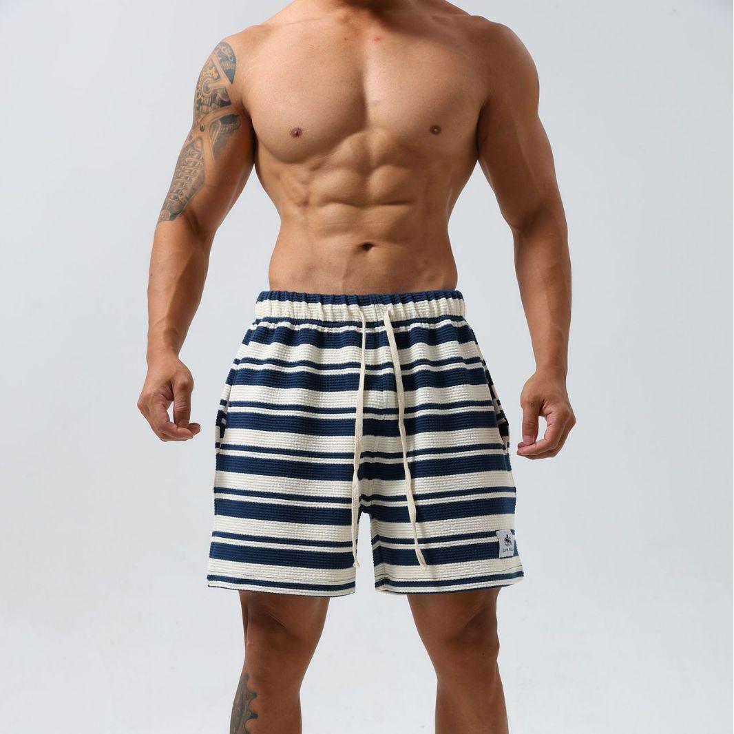 Black striped moisture-wicking sports shorts for men, size 2XL, designed for active wear and athletic comfort.