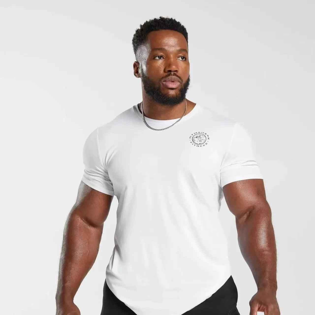 Black loose sports T-shirt from My Store featuring a shark graphic on the back, made of breathable fabric for active wear.