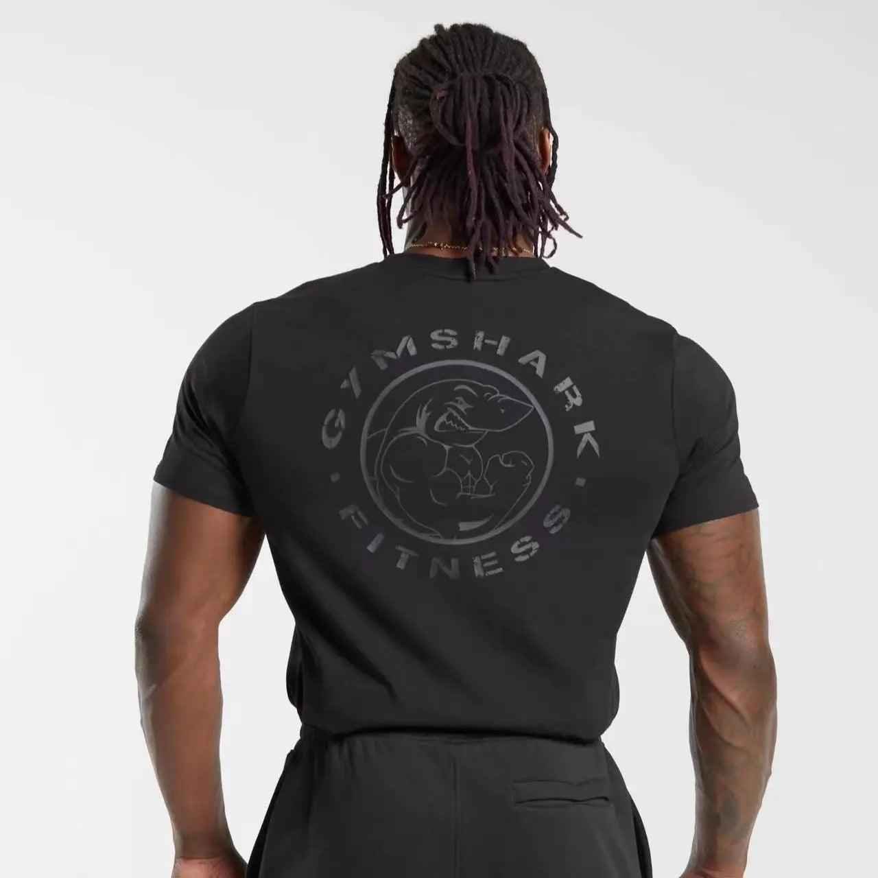 Black loose sports T-shirt from My Store with shark graphic on the back, made of lightweight, breathable fabric.