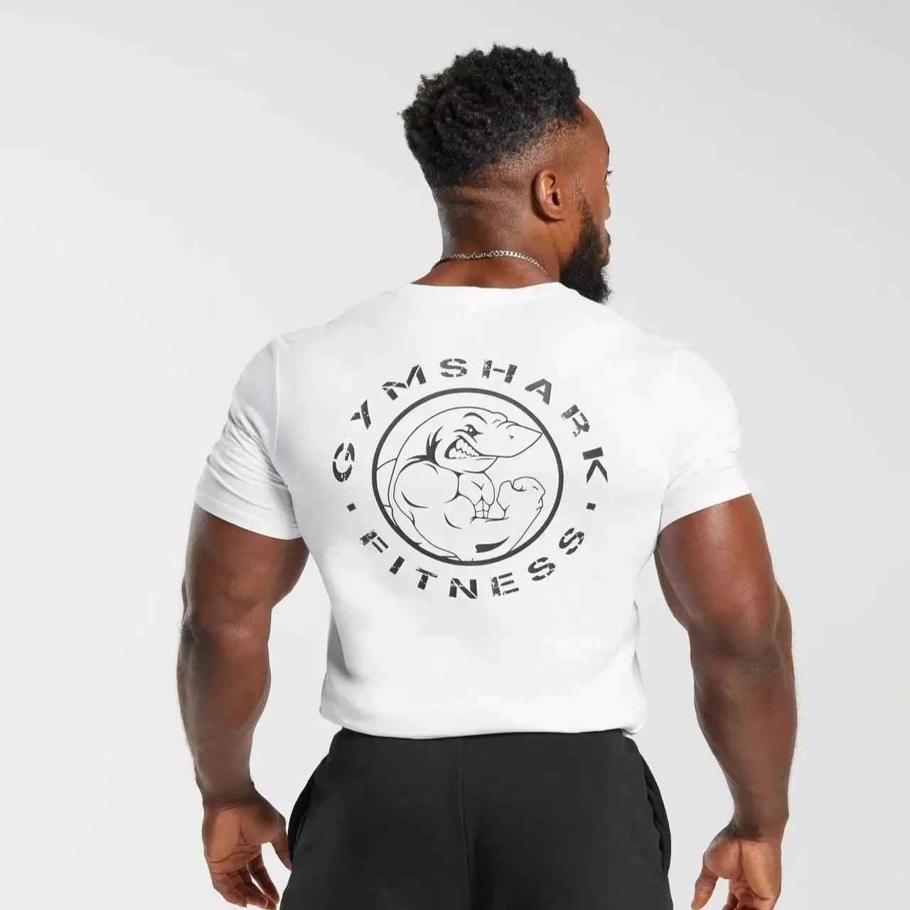 Black loose sports T-shirt by My Store, featuring a shark graphic on the back and a comfortable, relaxed fit.