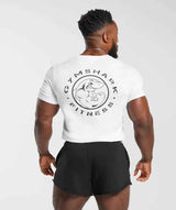 Black loose-fit sports T-shirt with shark graphic on the back, designed for active wear and casual style.