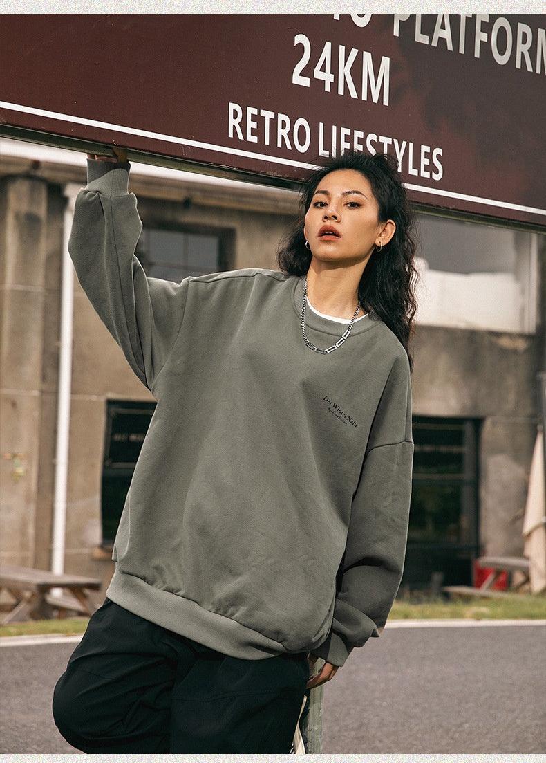 Apricot retro print crew neck sweatshirt by My Store, loose fit, casual long sleeve top with vibrant retro design.