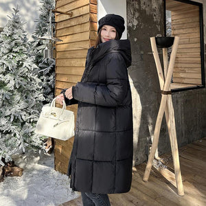 Mid Length Plus Size Hooded Cotton Coat - MRC STORETopMy StoreA woman wearing a mid - length hooded cotton coat in a milky white color, standing near a Christmas tree and wooden structures.MRC STORECJJK211344730DWBeige3XL
