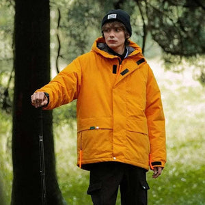 Street Windproof Hooded Cotton Jacket - MRC STORETopMy StoreA person wearing a khaki green hooded cotton jacket with a zipper, standing in a wooded area.MRC STORECJYR165417005EVKhakiL
