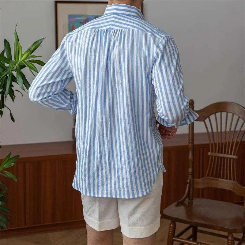 Blue breathable seersucker striped long-sleeved shirt, stylish top from My Store with comfortable fabric and classic pattern.