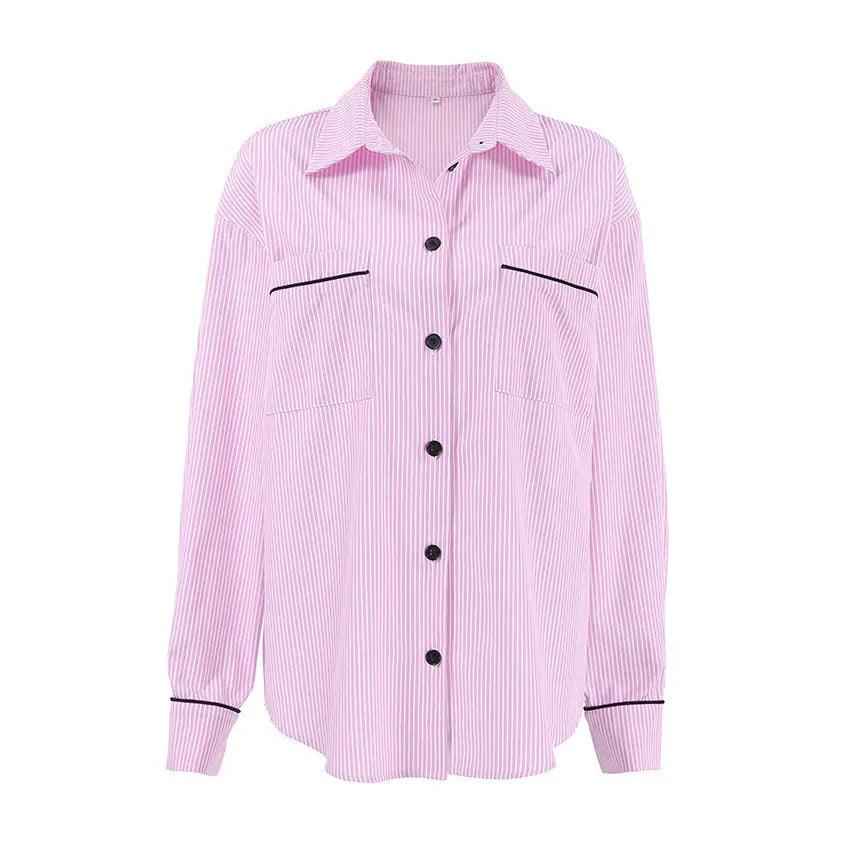 Striped loose fit top in soft fabric, featuring long sleeves and a relaxed style, perfect for casual wear.