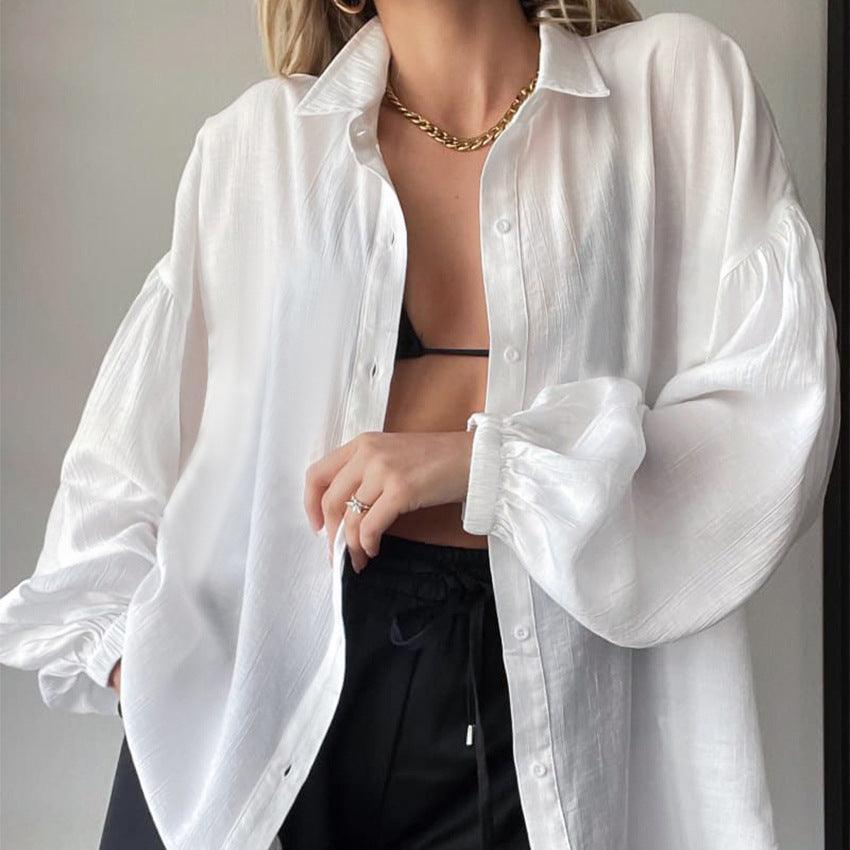 White summer lantern sleeve transparent top, stylish and flowy, featuring a lightweight design and elegant sleeve details.