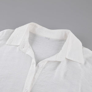 White lantern sleeve summer top with transparent fabric, stylish and lightweight, perfect for warm weather.