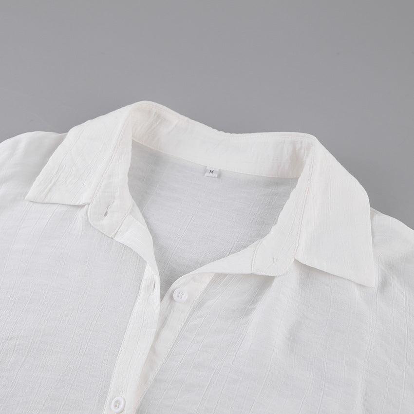 White lantern sleeve summer top with transparent fabric, stylish and lightweight, perfect for warm weather.