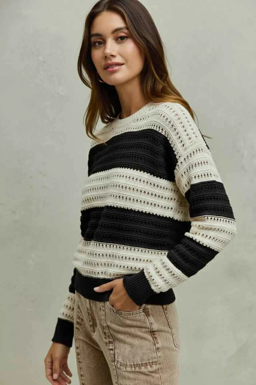 Cream and black openwork wide stripe textured sweater pullover by Trendsi, featuring a stylish, cozy knit design.